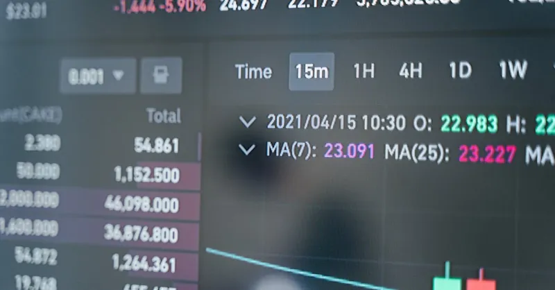 Close-up of a cryptocurrency trading screen displaying real-time data, graphs, and analytics.