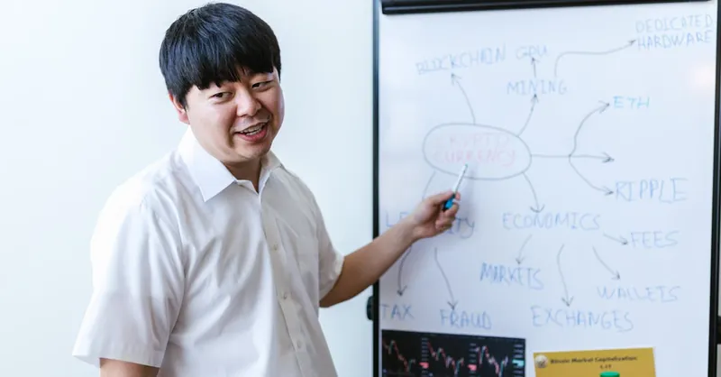 A professional explaining cryptocurrency concepts on a whiteboard during a seminar.