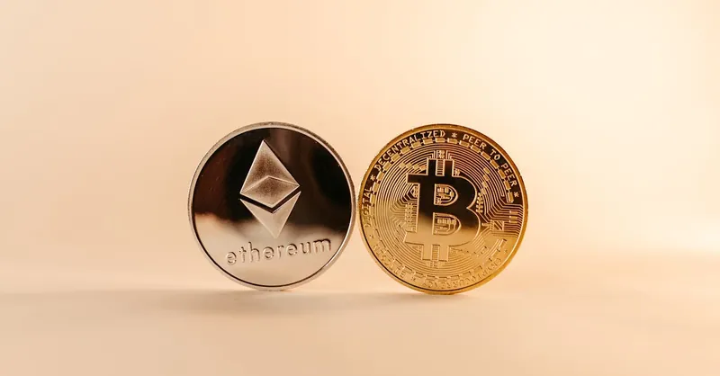 Close-up of Bitcoin and Ethereum coins symbolizing digital currency and blockchain technology.